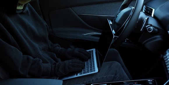 car-thief-laptop-shutterstock_2557832695-725